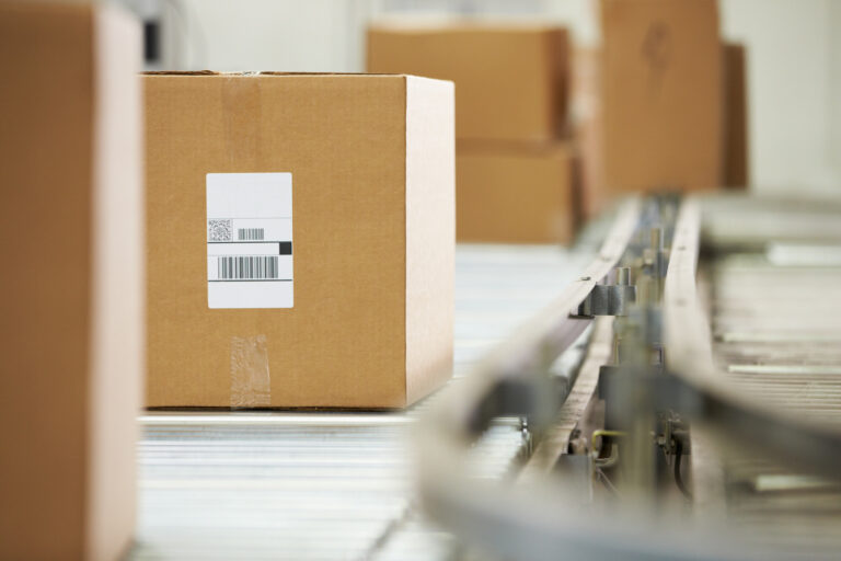 Corrugated Cardboard Shipping Box with label on conveyor